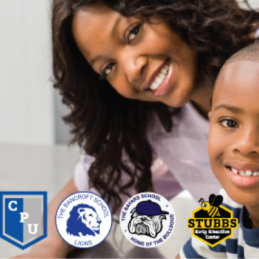  Close up of a happy mother and son near a computer